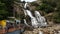 People bathing kutralam waterfalls in India, Tamil Nadu, Kutralam.