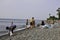 PEOPLE ON THE BEACH OF BLACK SEA IN BATUMI