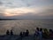 People on the beach at dusk, central java, Indonesia, July 12, 2022