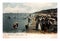 People on the beach of luxury sea resort Trouville, France, circa 1904,