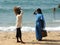 People on beach after tsunami 2004