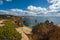 People at the beautiful Camilo Beach Praia do Camilo and the surrounding cliffs in Lagos, Portugal