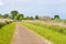 People bicycling on Tiengemeten island in Haringvliet estuary, N