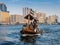 People on board of abra water taxi across the Creek in Dubai