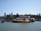 People board Ferry Boat with RocketBoat in front of it in marina