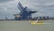 People boarding the Ferry across the estuary of the river Orwell from Felixstowe to Harwich, Felixstowe Docks in the background.