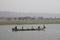 People in a boat on lake Volta in the Volta Region in Ghana