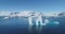 People boat tour expedition to Antarctica iceberg