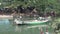 People on a boat, The young fishermen is floating on the lake.