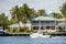 People boating tour by mansions in Fort Lauderdale FL USA