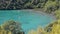 People on boats in blue lagoon at sunny day