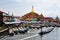 People with boats at the grand market in Inlay, Myanmar