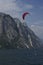 People in boats and on the water practicing sailing and sailing sports. Lake Garda