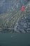 People in boats and on the water practicing sailing and sailing sports. Lake Garda