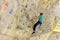 People bouldering in a climbing hall - indoor sports