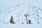 People on button ski lift on Feuerkogel mountain plateau, Salzkammergut, Austria