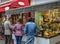 People buying baguette at downtown Paris