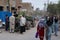 People buying watermelons in a street market in the city of Kashgar, Xinjiang