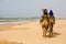 People on the camel at the beach near Essaouira