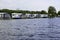 People camping with a caravan next to a lake in National Park Weerribben-Wieden, The Netherlands