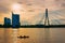 People in canoe on Daugava River and Vansu Bridge Riga