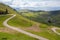 People and cars on windy Panoramastrasse scenic road leading up