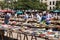 People choosing used books at the flea Aligre Market. Paris, Fra