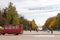 People in the city park with wide footpath in Chernihiv, Ukraine