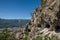 People Climbing Mountain by Mandrin Caves