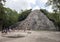 People climbing up an down the Nohoch Mul Pyramid in the Coba ruins