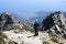 People climbing up mount Capanne on Elba island, Italy