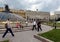 People at the `Clock of the World` fountain on Manezhnaya Square in Moscow.