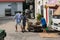 People collecting paper waste for recycling in Singapore