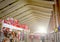 People and commuters walking inside the Termini railways station in Rome, Italy