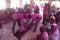 People  covered is colored powder performing rituals  at Shiv temple for Katebaras Festival celebration or Thorn burning ritual