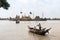 people cross yangon river by boat for pray at Ye Le Paya pagoda the floating pagoda on small island