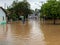 People crossing flooded streets - Capivari river overflow - Sao Paulo - Brazil