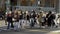 People crossing road in Manhattan. Busy sidewalk and crossroad in NYC