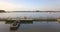 People crossing a small pontoon bridge connecting island Lido to Belgrade\\\'s mainland