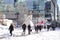 People crossing snow covered Robson Square in downtown Vancouver