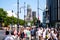 People crossing street at Berlin`s most famous shopping avenue,