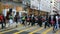 People crossing a street in Hong Kong