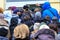 People crowd near the store during the sale. Shoppers enter the mall on Black Friday