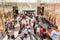 People Crowd Shopping In Luxury Mall Interior