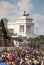 People crowd under monument Altar of the fatherland (Piazza Venezia - Roma)