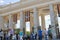 People crowds enter and leave Gorky park by the main entrance gates.