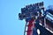 People descending at amazing Sheikra Rollercoaster in Bush Gardens Tampa Bay Theme Park.