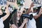 People from different ages and races protest on the street for equal rights - Demonstrators wearing face masks during black lives