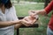 People disinfecting hands against coronavirus outdoor