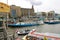 People on the dock landing on river cruise ships, Amsterdam